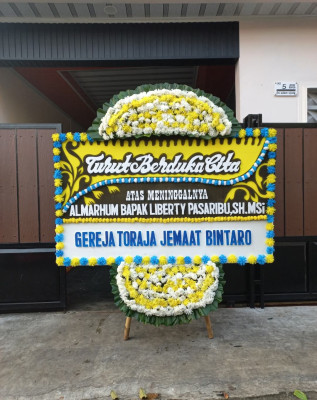 Papan Bunga Duka di Terong